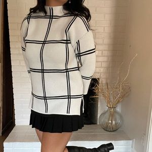 Black and white plaid mock neck sweater